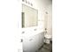 Modern bathroom with double vanity and gray cabinets at 13915 N 132Nd Ln, Surprise, AZ 85379