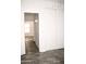 Bedroom with large closet and access to hallway at 13915 N 132Nd Ln, Surprise, AZ 85379