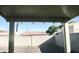 Covered patio provides shade and outdoor space at 13915 N 132Nd Ln, Surprise, AZ 85379