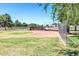 Baseball field with dugout and chain link fence at 14145 N 92Nd St # 1052, Scottsdale, AZ 85260