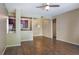 Open concept living room with kitchen view and hardwood floors at 14145 N 92Nd St # 1052, Scottsdale, AZ 85260