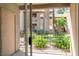 View from patio shows complex building and courtyard at 14145 N 92Nd St # 1052, Scottsdale, AZ 85260