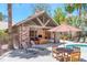 Community pool area with covered patio and seating at 14145 N 92Nd St # 1052, Scottsdale, AZ 85260