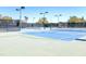 Two well-lit tennis courts available for residents at 14145 N 92Nd St # 1052, Scottsdale, AZ 85260