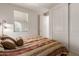 Cozy bedroom with a queen-size bed and a large window at 14815 N Fountain Hills Blvd # 201, Fountain Hills, AZ 85268