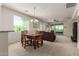 Dining area with table and chairs, open to living room at 14815 N Fountain Hills Blvd # 201, Fountain Hills, AZ 85268