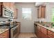 Kitchen with granite countertops and stainless steel appliances at 14815 N Fountain Hills Blvd # 201, Fountain Hills, AZ 85268