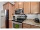 Modern kitchen featuring granite countertops and stainless steel appliances at 14815 N Fountain Hills Blvd # 201, Fountain Hills, AZ 85268