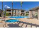 Community pool and spa with lounge chairs at 14815 N Fountain Hills Blvd # 201, Fountain Hills, AZ 85268