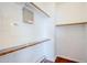 Spacious closet with wood shelving and flooring at 14971 W Desert Hills Dr, Surprise, AZ 85379