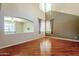 Living room with hardwood floors, high ceilings, and views at 14971 W Desert Hills Dr, Surprise, AZ 85379