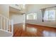 Spacious living room with hardwood floors and high ceilings at 14971 W Desert Hills Dr, Surprise, AZ 85379