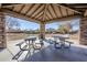 Park pavilion with picnic tables at 14971 W Desert Hills Dr, Surprise, AZ 85379