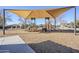 Modern playground with shaded play structure at 14971 W Desert Hills Dr, Surprise, AZ 85379