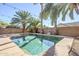 Relaxing rectangular pool in backyard oasis at 14971 W Desert Hills Dr, Surprise, AZ 85379