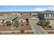 Single-story house with landscaping and a two-car garage at 17838 W Gambit Trl, Surprise, AZ 85387