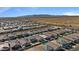 Wide shot of community with desert landscape and mountains at 17838 W Gambit Trl, Surprise, AZ 85387