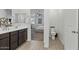Bathroom with double vanity and toilet at 17838 W Gambit Trl, Surprise, AZ 85387