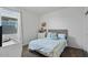 Bedroom with window and neutral-toned bedding at 17838 W Gambit Trl, Surprise, AZ 85387
