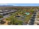 Community pool with parking, landscaping, and seating at 17838 W Gambit Trl, Surprise, AZ 85387