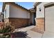 Front entrance with stone detailing and walkway at 17838 W Gambit Trl, Surprise, AZ 85387