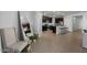 Modern kitchen with dark cabinetry, granite counters and island at 17838 W Gambit Trl, Surprise, AZ 85387