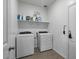 Bright laundry room with washer and dryer included at 17838 W Gambit Trl, Surprise, AZ 85387