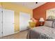 Bedroom with yellow chair and gray bedding at 1840 S Vista Rd, Apache Junction, AZ 85119