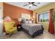 Bedroom with yellow chair and gray bedding at 1840 S Vista Rd, Apache Junction, AZ 85119