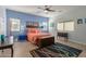 Bright bedroom with coral bedding and tiled floors at 1840 S Vista Rd, Apache Junction, AZ 85119