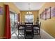 Dining room with a large table and six chairs, plus sliding glass doors at 1840 S Vista Rd, Apache Junction, AZ 85119