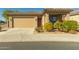 Single-story home with a two-car garage and landscaped front yard at 1840 S Vista Rd, Apache Junction, AZ 85119