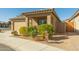 Front view of a house with a two-car garage, landscaping, and walkway at 1840 S Vista Rd, Apache Junction, AZ 85119