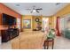Living area featuring comfortable seating, a large TV, and a ceiling fan at 1840 S Vista Rd, Apache Junction, AZ 85119