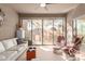 Relaxing sunroom with comfy seating and view of backyard at 1840 S Vista Rd, Apache Junction, AZ 85119