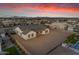 Aerial view of a house with a large backyard, pool, and neighboring houses at 19727 E Vallejo St, Queen Creek, AZ 85142