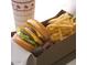 Double cheeseburger, fries, and soda in a takeout box at 2100 W Lemon Tree Pl # 84, Chandler, AZ 85224