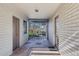 Back patio access with brick flooring and wrought iron gate at 245 W Berridge Ln, Phoenix, AZ 85013