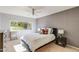 Bedroom with a blue bed frame and a large window at 245 W Berridge Ln, Phoenix, AZ 85013