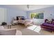Bedroom with a comfy bed, armchair, and window at 245 W Berridge Ln, Phoenix, AZ 85013