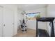 Bright home gym with treadmill and weight machine at 245 W Berridge Ln, Phoenix, AZ 85013