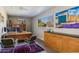Spacious home office with wood desk and ample storage at 245 W Berridge Ln, Phoenix, AZ 85013