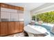 Charming kitchen nook with built-in seating and a view of the backyard at 245 W Berridge Ln, Phoenix, AZ 85013