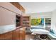 Built-in retro kitchen refrigerator, perfect for entertaining at 245 W Berridge Ln, Phoenix, AZ 85013