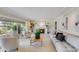 Spacious living room features fireplace, large windows and comfortable seating at 245 W Berridge Ln, Phoenix, AZ 85013