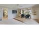 Large main bedroom with built in shelving and an attached ensuite bathroom at 245 W Berridge Ln, Phoenix, AZ 85013