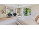 Bright main bedroom featuring a private walkout to the backyard and built in shelving at 245 W Berridge Ln, Phoenix, AZ 85013