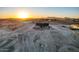 Aerial view of a new house on a lot with desert landscape at 2875 S 364Th Dr, Tonopah, AZ 85354