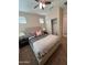 Spacious bedroom with ceiling fan, large bed, and ample closet space at 29316 N Lone Pine Ln, Rio Verde, AZ 85263