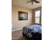 Bright bedroom with carpeted floor, large window, and comfortable bed at 29316 N Lone Pine Ln, Rio Verde, AZ 85263